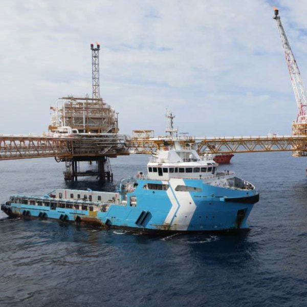 Supply boat (crew boat) transfer cargo to oil and gas industry at offshore and moving cargo from the boat to the platform.